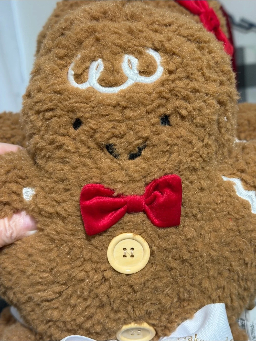 cupcakes & cashmere Brown Gingerbread Family Plush Holiday Pillow with Red Bow